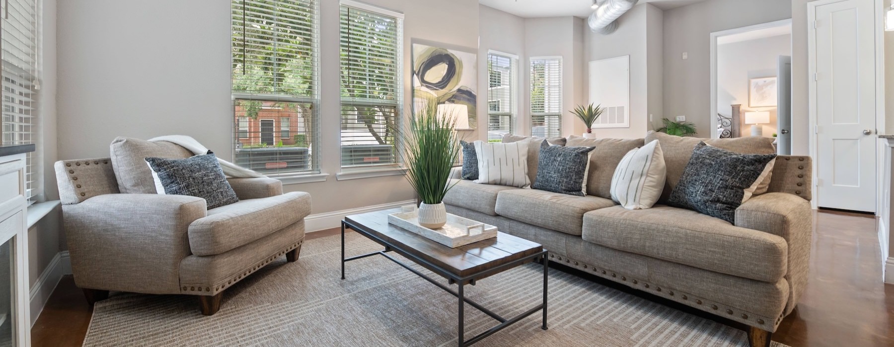 a living room with a couch and coffee table